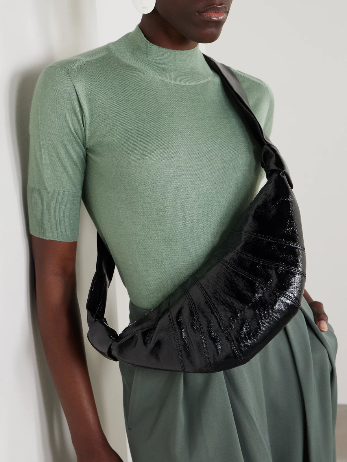 Image of Bags. Product name - Croissant Small Paneled Coated-canvas Shoulder Bag in Black colour by brand - LEMAIRE