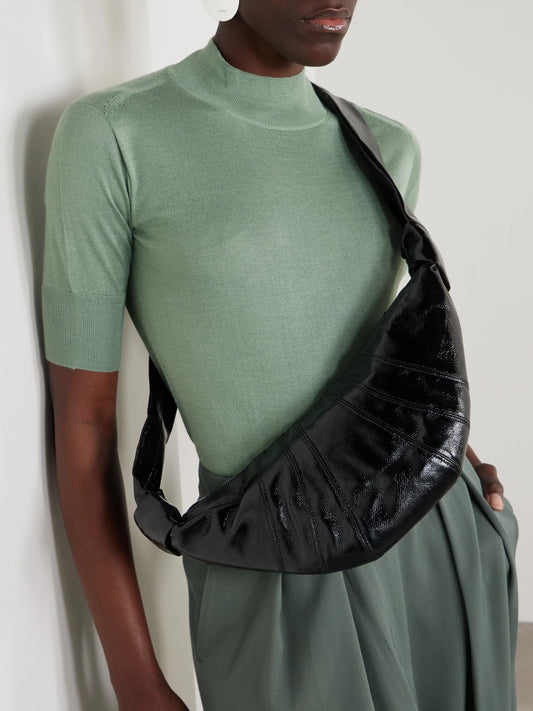 Image of Bags. Product name - Croissant Small Paneled Coated-canvas Shoulder Bag in Black colour by brand - LEMAIRE