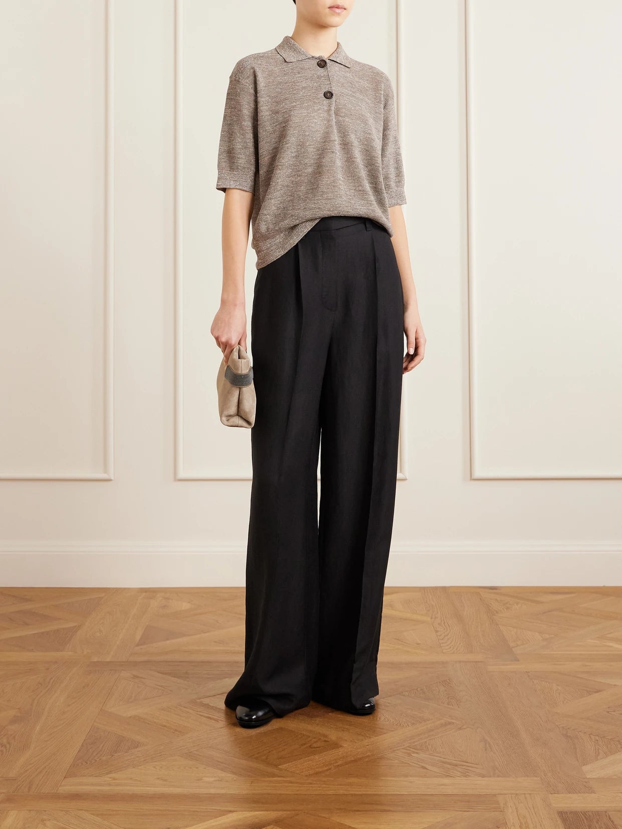 Image of a model wearing Outerwear. Product name - Metallic-knit Polo Shirt in Brown colour by brand - Brunello Cucinelli