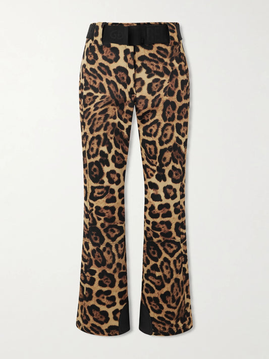 Image of a model wearing Pants. Product name - Minou Belted Leopard-print Ski Pants in Leopard print colour by brand - Goldbergh