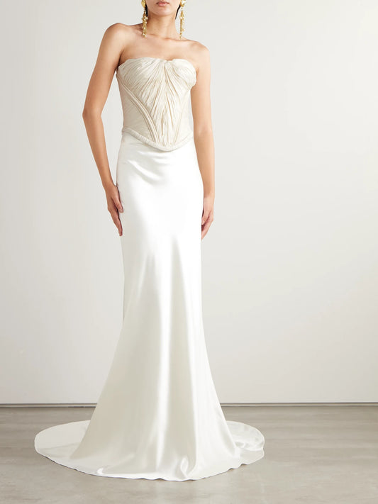 Image of a model wearing Tops. Product name - Priscilla Strapless Gathered Taffeta Bustier Top in Ivory colour by brand - Danielle Frankel