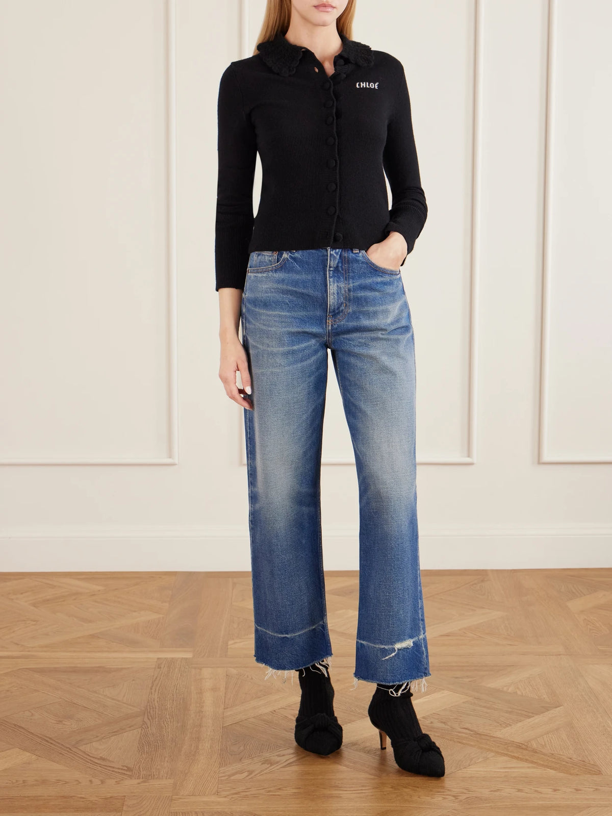 Image of Boots. Product name - Knotted Knitted Boots in Black colour by brand - Chloé