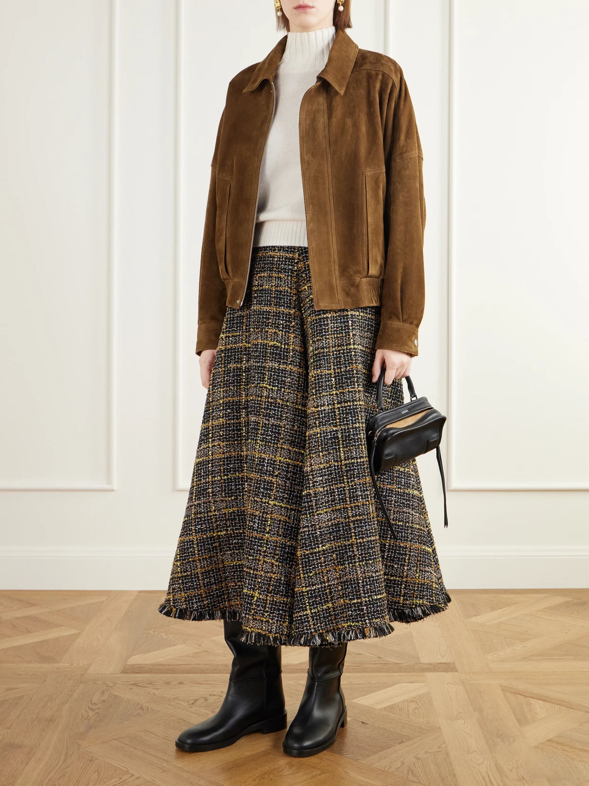 Image of a model wearing Skirts. Product name - Varda Fringe-trimmed Tweed Midi Skirt in Multi colour by brand - Altuzarra