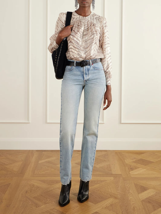 Image of a model wearing Tops. Product name - Farali Animal-print Lurex Silk-blend Shirt in Zebra print colour by brand - ISABEL MARANT