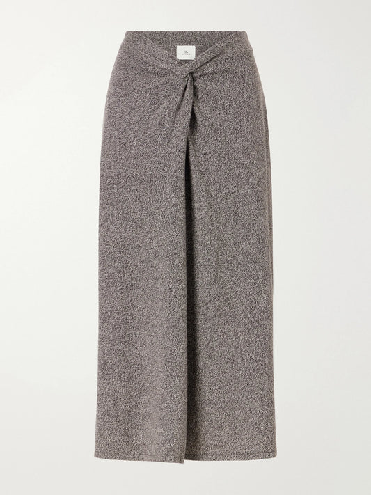 Image of a model wearing Skirts. Product name - Knotted Marl Knitted Cashmere Midi Skirt in Brown colour by brand - The Elder Statesman