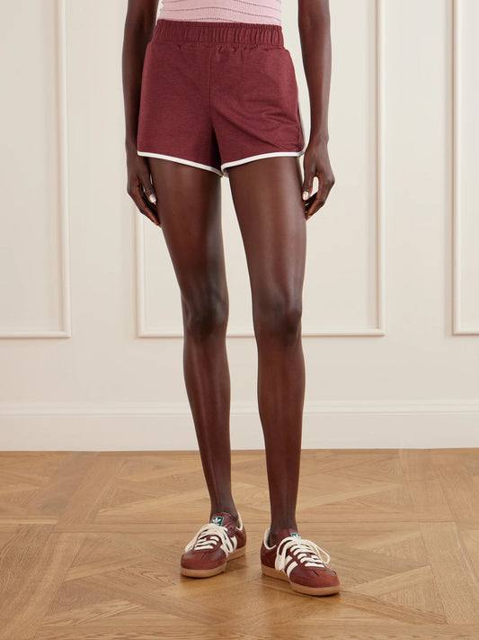 Image of a model wearing Shorts. Product name - Marty Jersey Shorts in Burgundy colour by brand - Varley