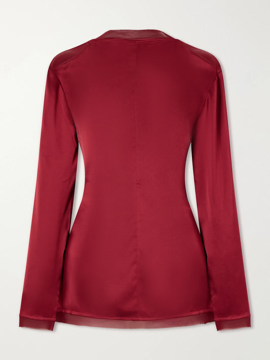 Image of a model wearing Tops. Product name - Beau Knotted Silk Blouse in Burgundy colour by brand - TOVE