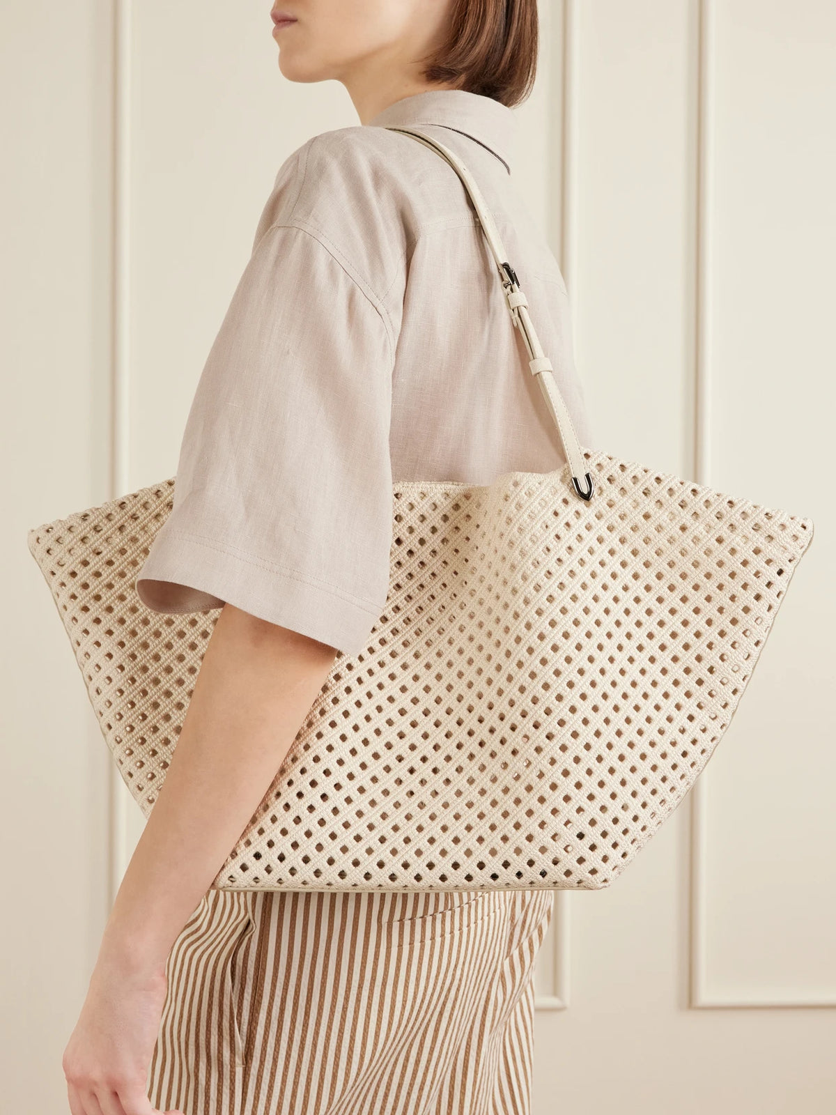 Image of Bags. Product name - Leather-trimmed Woven Shoulder Bag in Ivory colour by brand - Brunello Cucinelli