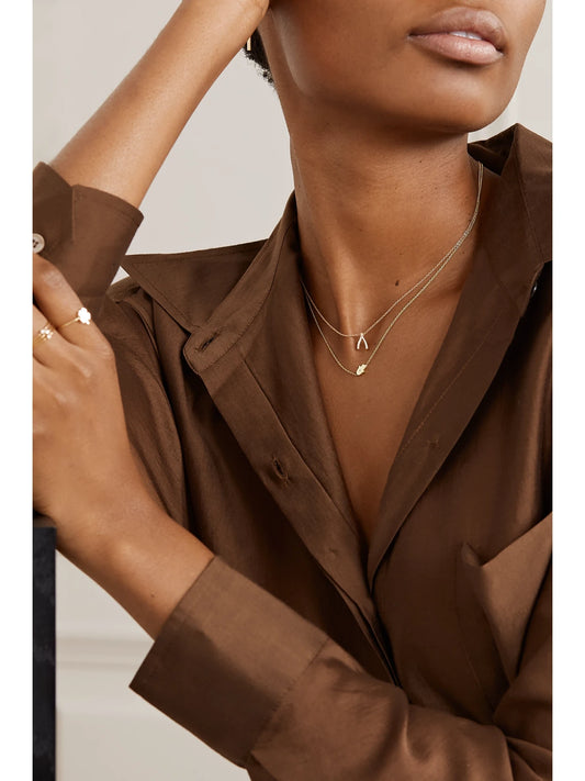 Image of Necklaces. Product name - Mini Hamsa 18-karat Gold Diamond Necklace in Multi colour by brand - Jennifer Meyer