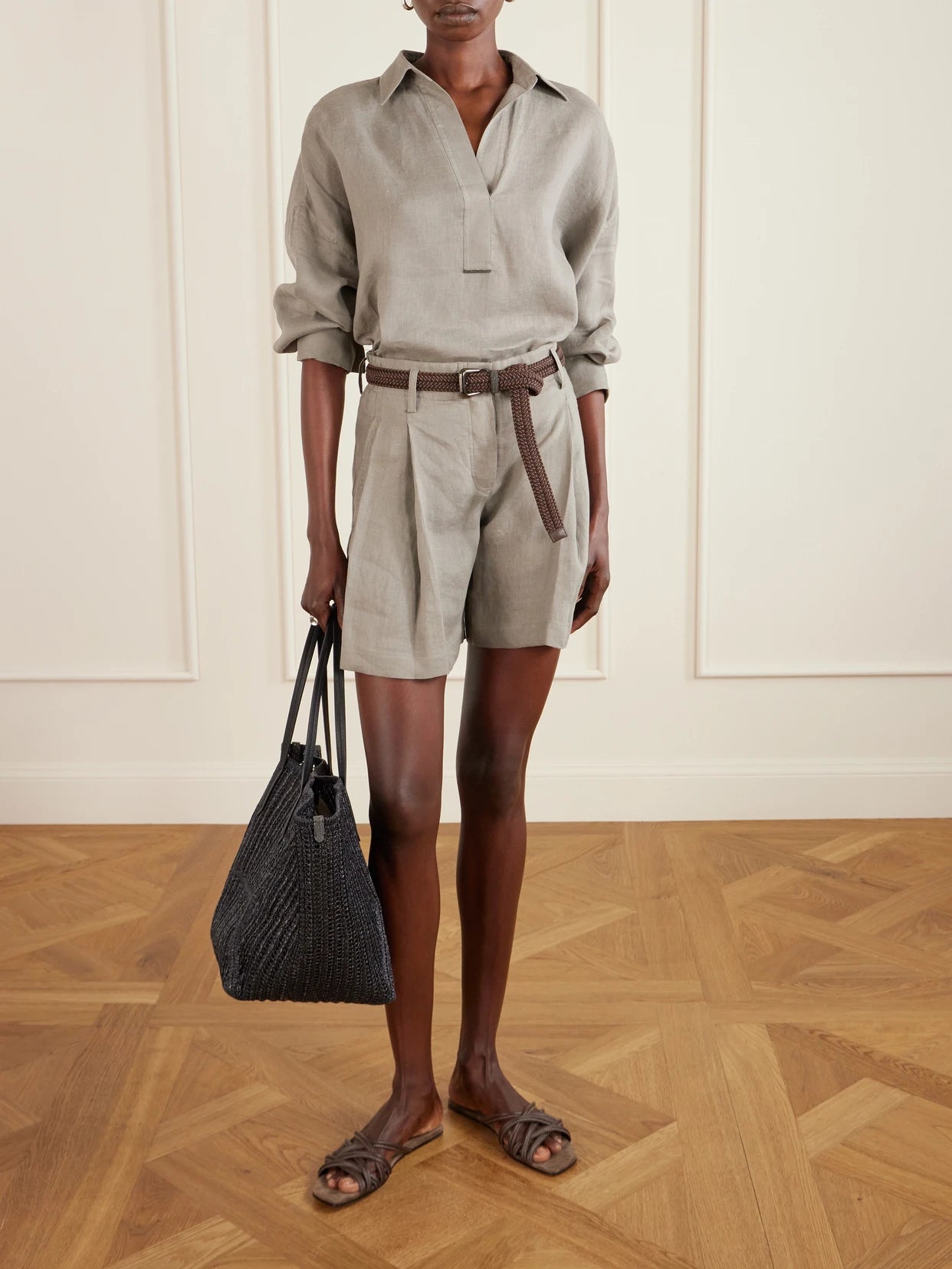 Image of a model wearing Tops. Product name - Linen Blouse in Army green colour by brand - Brunello Cucinelli