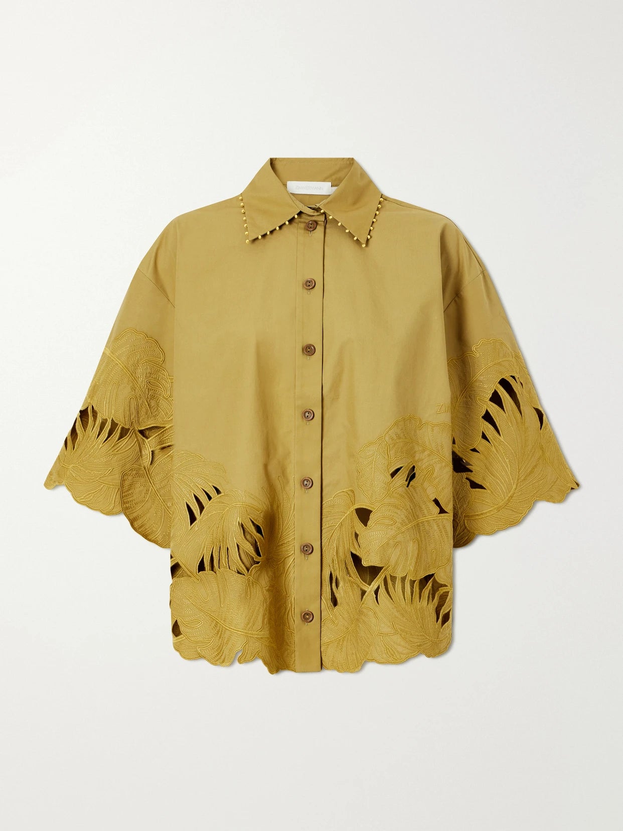 Image of a model wearing Tops. Product name - Mahon Embroidered Cotton Shirt in Green colour by brand - Zimmermann