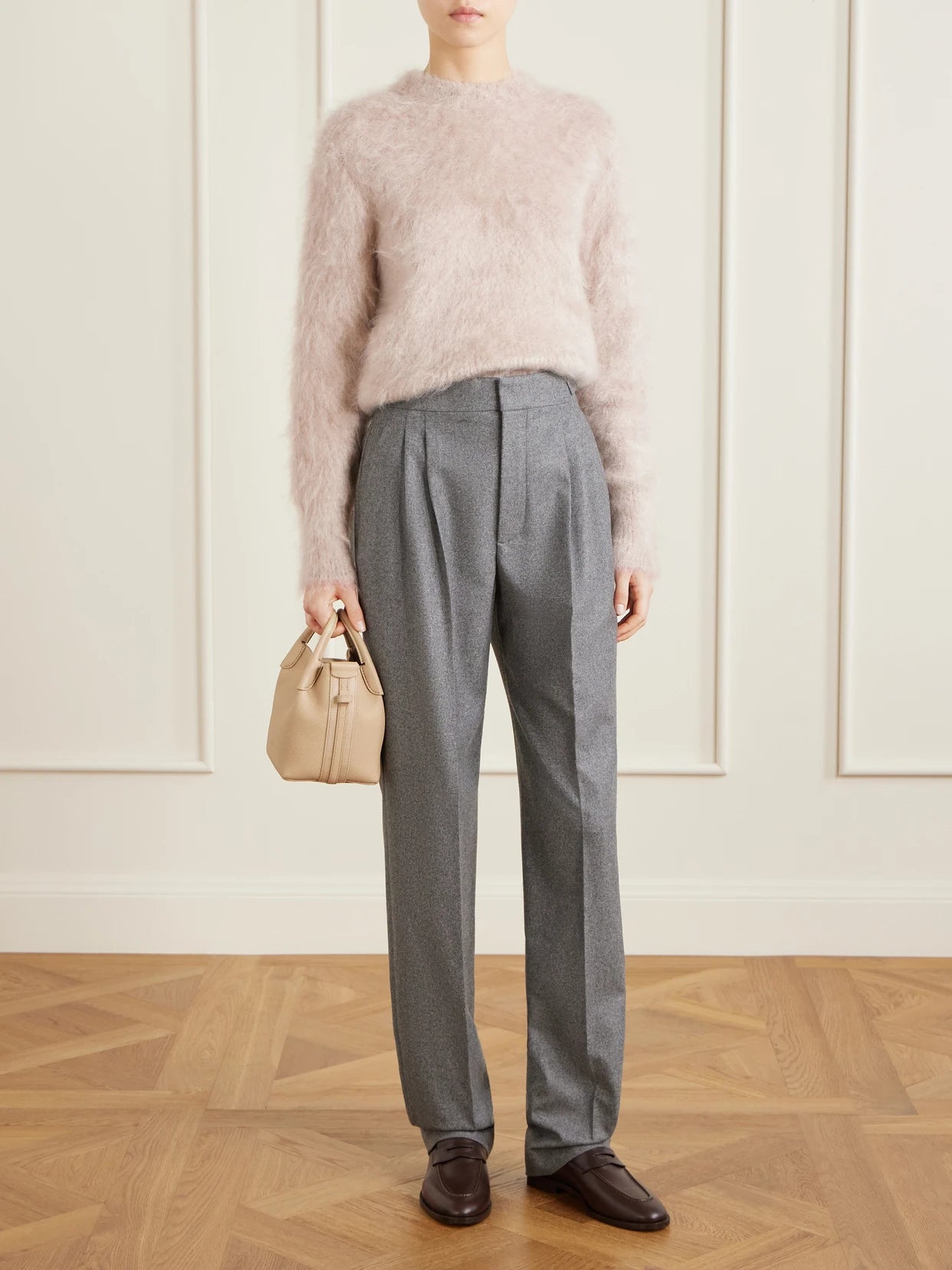 Image of a model wearing Pants. Product name - Malik Pleated Wool And Cashmere-blend Straight-leg Pants in Gray colour by brand - Loro Piana
