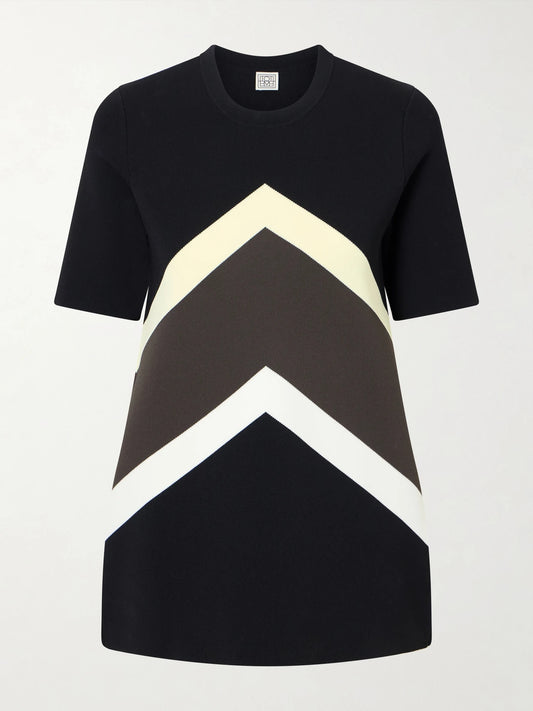 Image of a model wearing Tops. Product name - Striped Jersey T-shirt in Black colour by brand - TOTEME