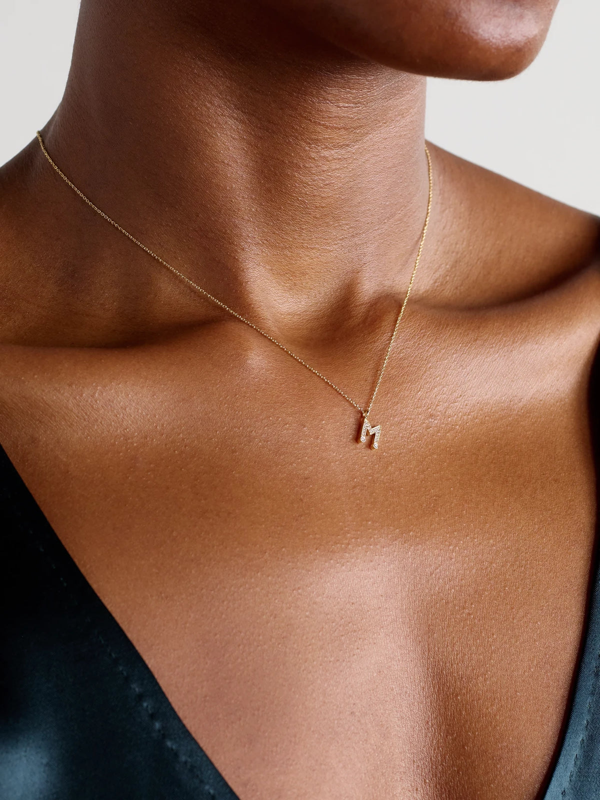 Image of Necklaces. Product name - Simple Letter 18-karat Recycled Gold Diamond Necklace in A colour by brand - Sophie Bille Brahe