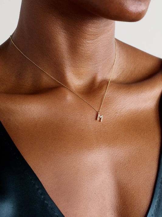 Image of Necklaces. Product name - Simple Letter 18-karat Recycled Gold Diamond Necklace in A colour by brand - Sophie Bille Brahe