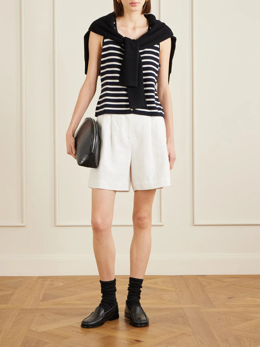 Image of a model wearing Outerwear. Product name - Striped Cashmere Vest in Black colour by brand - Allude