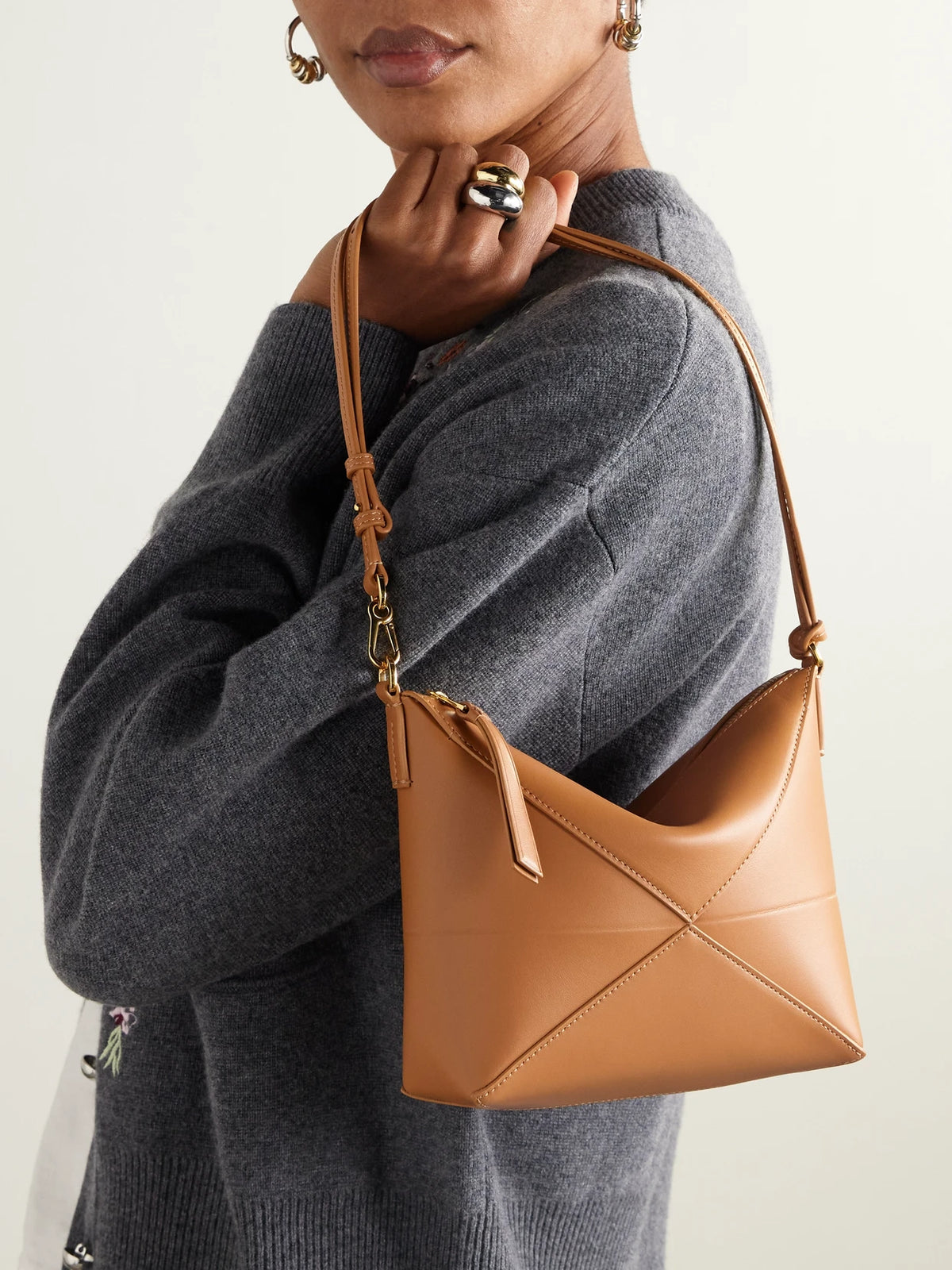 Image of Bags. Product name - Puzzle Fold Leather Clutch in Tan colour by brand - LOEWE