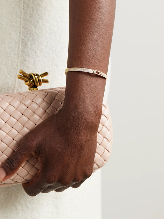Image of Bracelets. Product name - Move Noa 18-karat Gold Diamond Bangle in Multi colour by brand - Messika