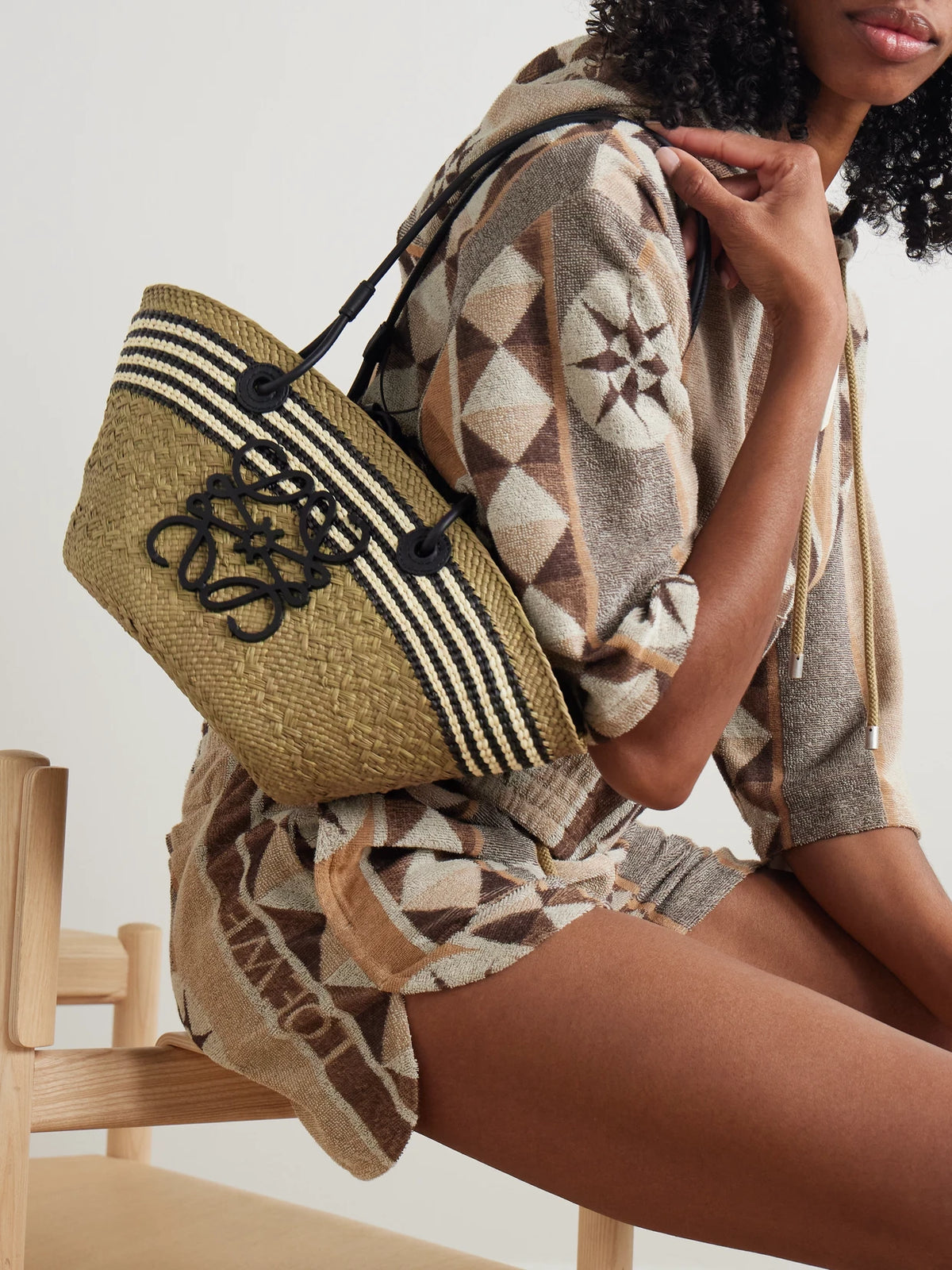 Image of Bags. Product name - + Paula's Ibiza Anagram Basket Small Leather-trimmed Striped Raffia Tote in Army green colour by brand - LOEWE