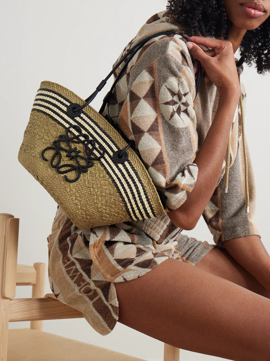 Image of Bags. Product name - + Paula's Ibiza Anagram Basket Small Leather-trimmed Striped Raffia Tote in Army green colour by brand - LOEWE