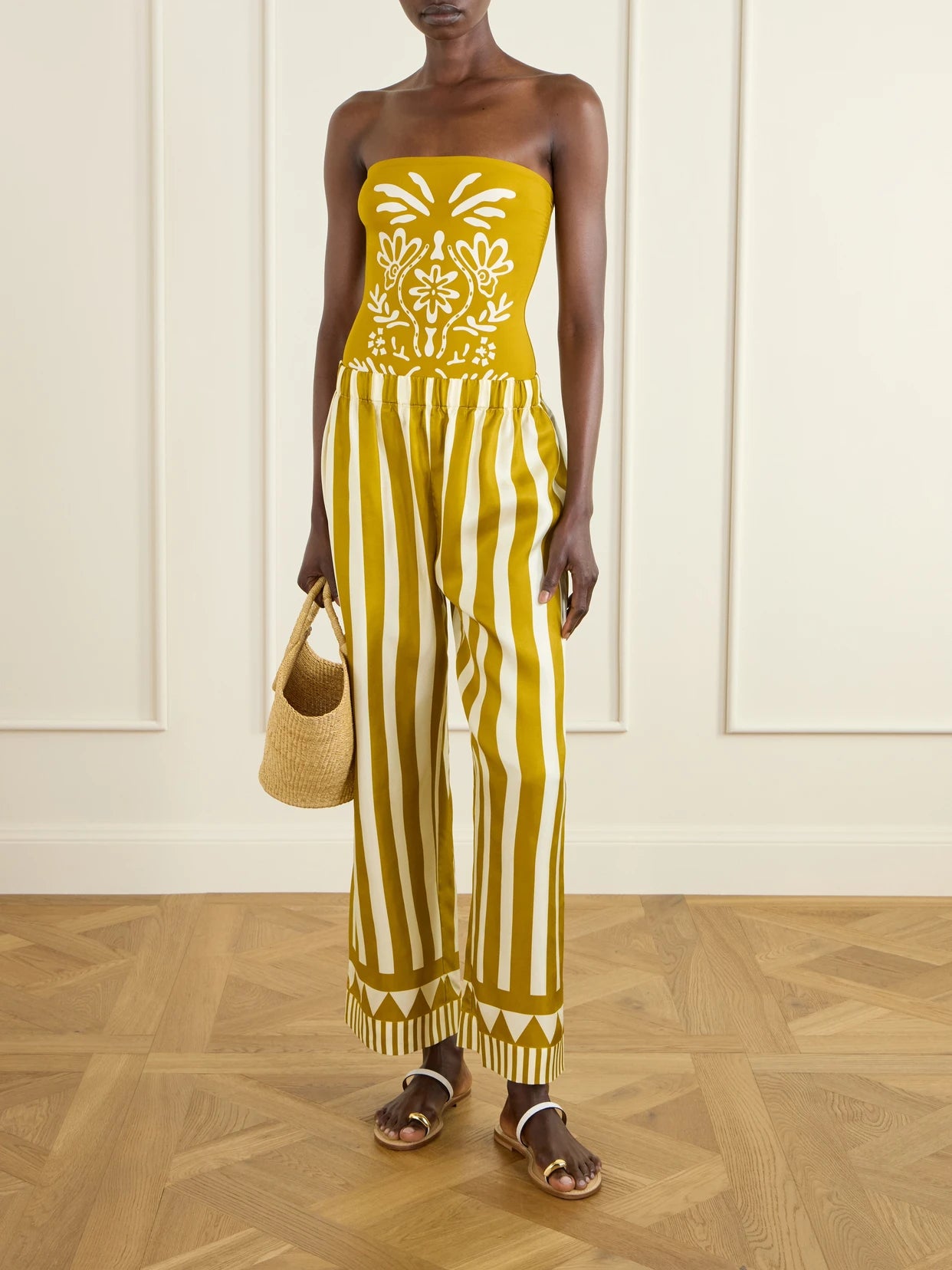Image of a model wearing Pants. Product name - Pacha Striped Silk-twill Straight-leg Pants in Yellow colour by brand - Eres