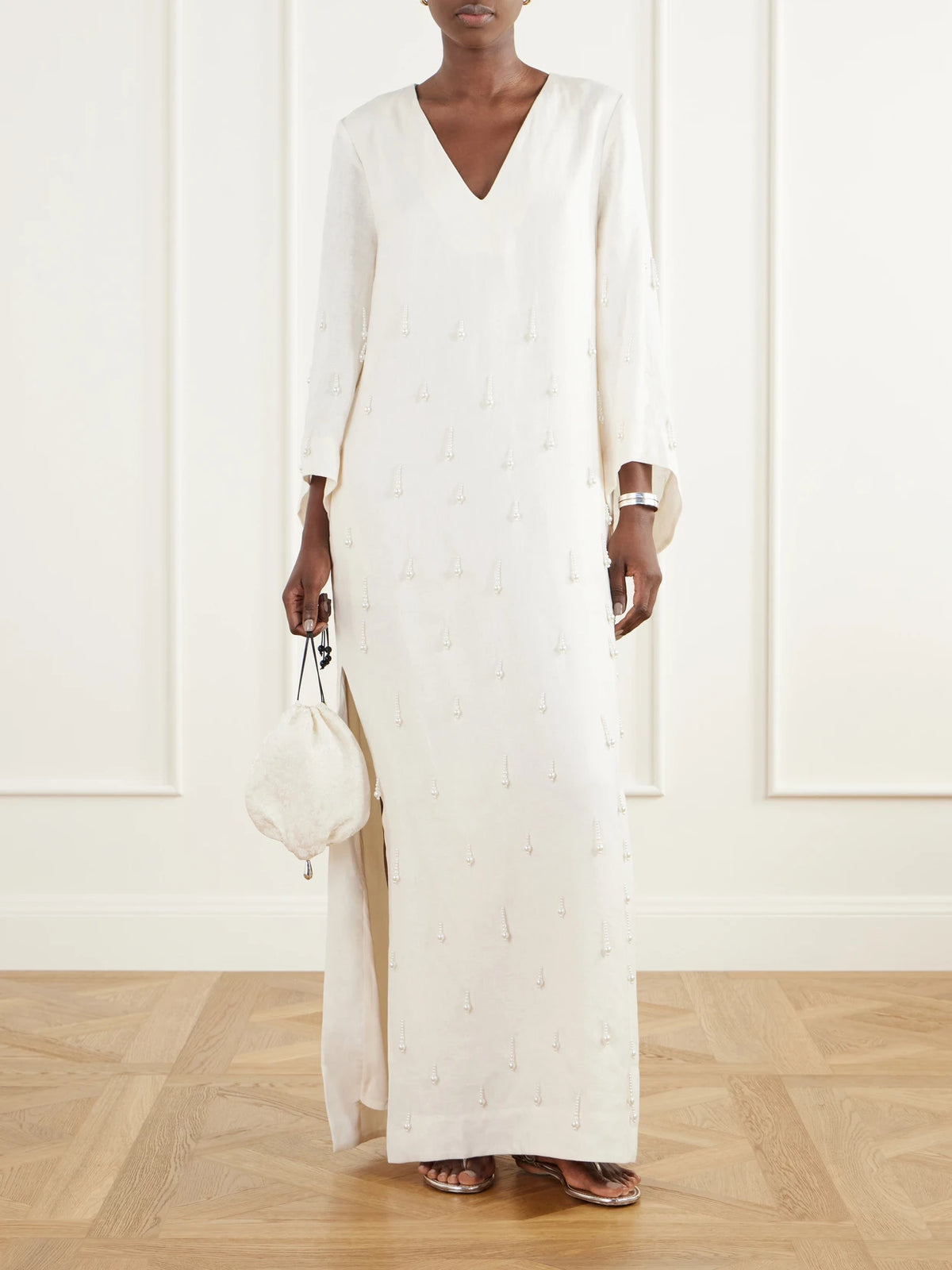 Image of Dresses. Product name - Velar Embellished Linen-woven Maxi Dress in Off-white colour by brand - Andres Otalora