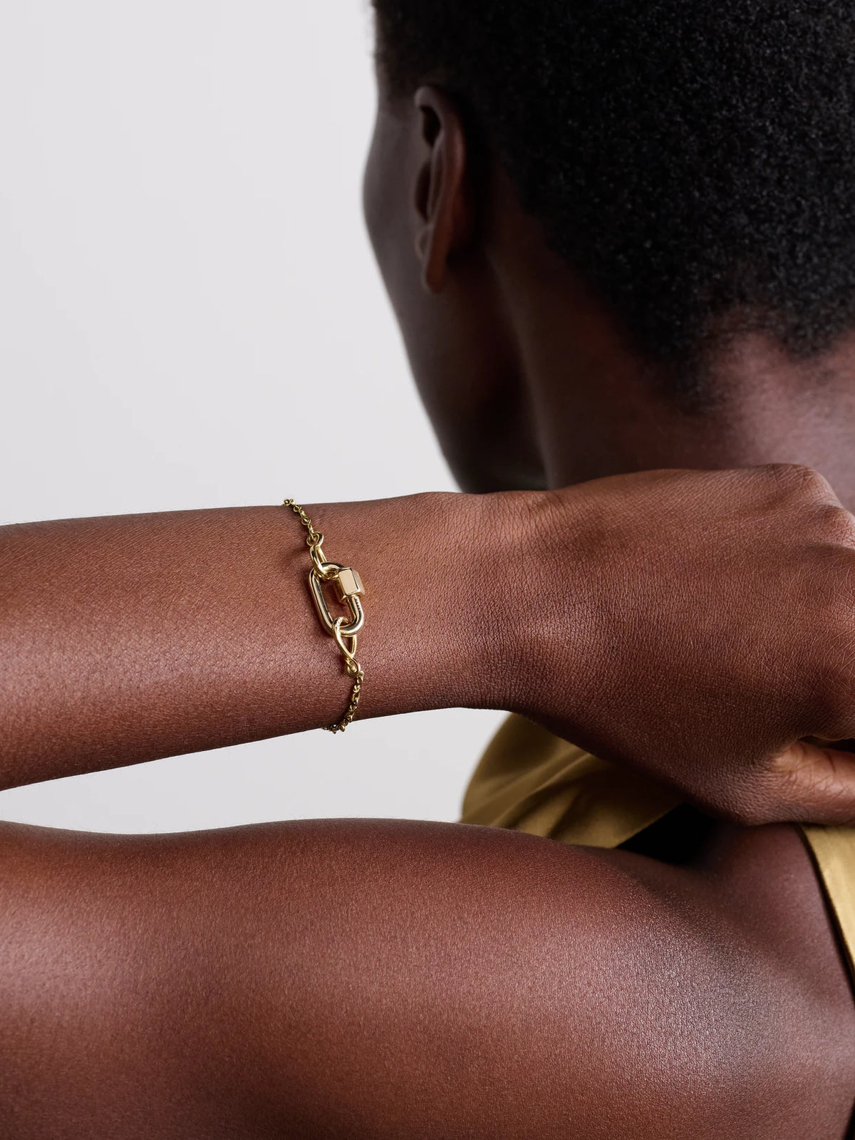 Image of Bracelets. Product name - True Lover's Knot 14-karat Gold Bracelet in Multi colour by brand - Marla Aaron