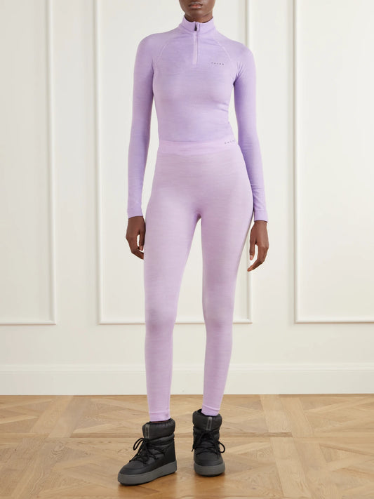 Image of a model wearing Pants. Product name - Stretch Wool-blend Leggings in Lilac, Ecru colour by brand - FALKE Ergonomic Sport System