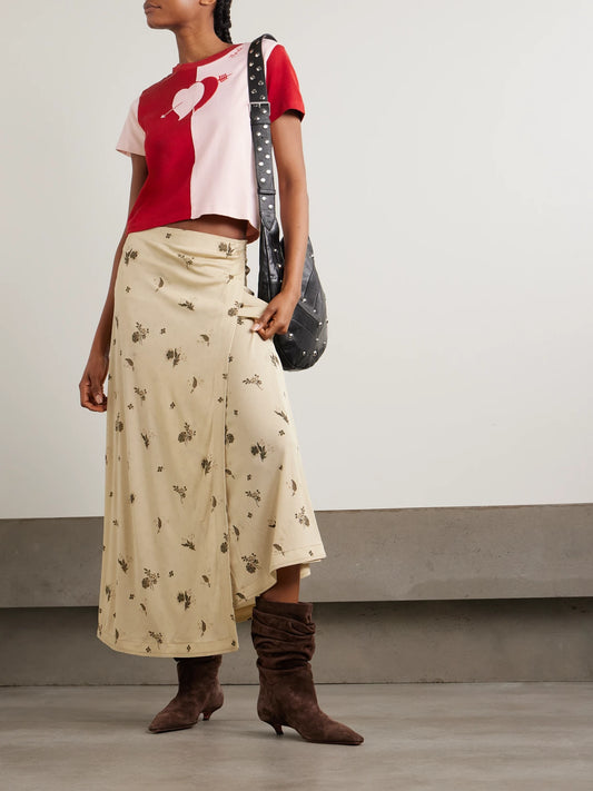 Image of a model wearing Tops. Product name - Wonderland Embroidered Jersey T-shirt in small colour by brand - BODE