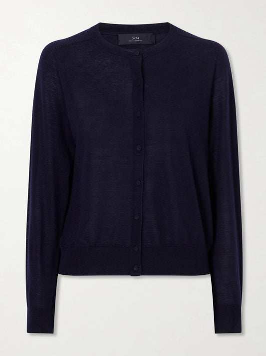 Image of a model wearing Outerwear. Product name - Elio Cashmere Cardigan in Navy colour by brand - Arch4
