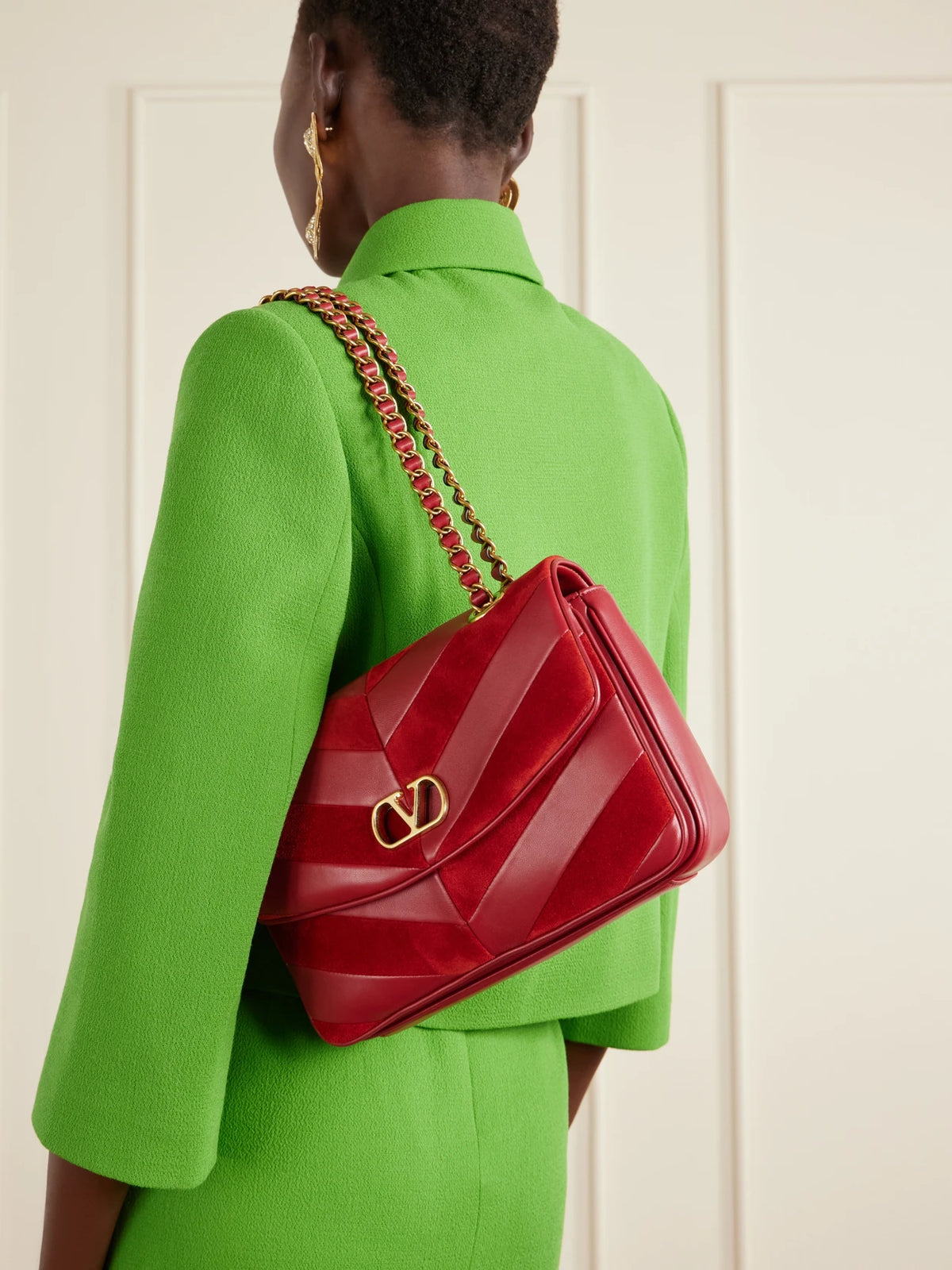 Image of Bags. Product name - Djuna Medium Embellished Leather Shoulder Bag in Red colour by brand - Valentino Garavani