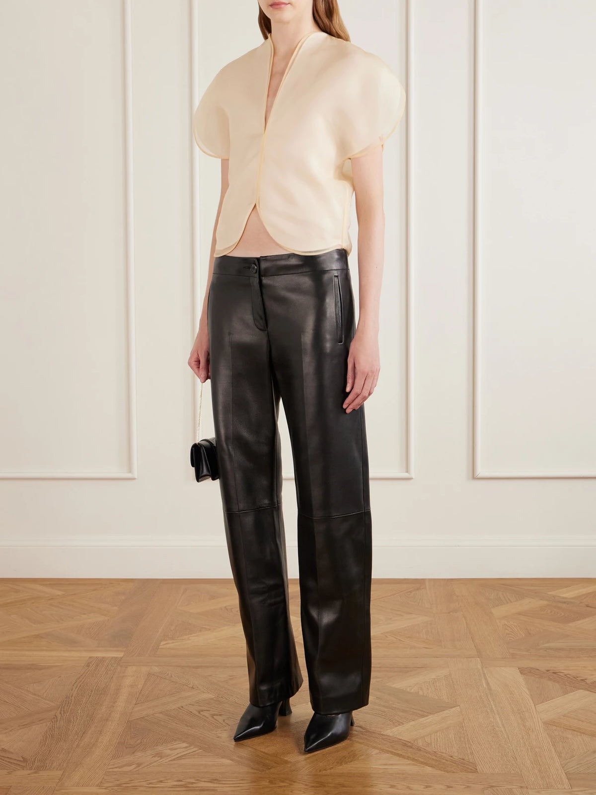Image of a model wearing Tops. Product name - Briar Silk-organza Blouse in Ivory, Chartreuse colour by brand - KHAITE