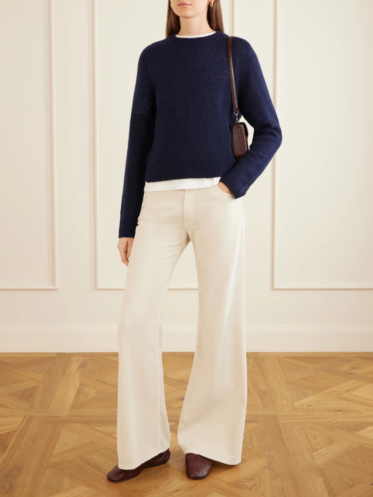 Image of a model wearing Outerwear. Product name - Solene Cashmere And Silk-blend Sweater in Navy colour by brand - LISA YANG
