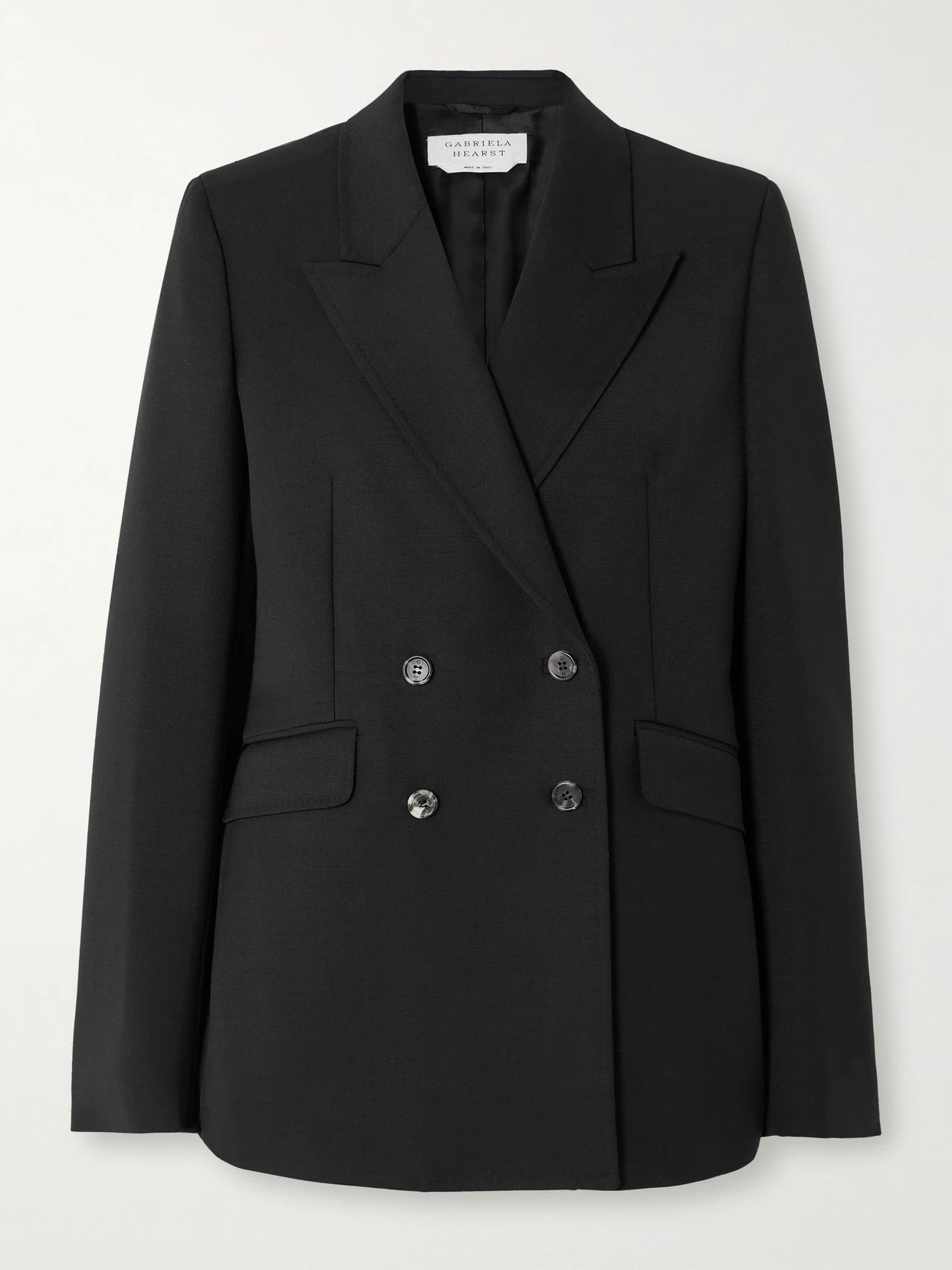 Image of a model wearing Outerwear. Product name - Angela Double-breasted Wool-crepe Blazer in Black colour by brand - Gabriela Hearst