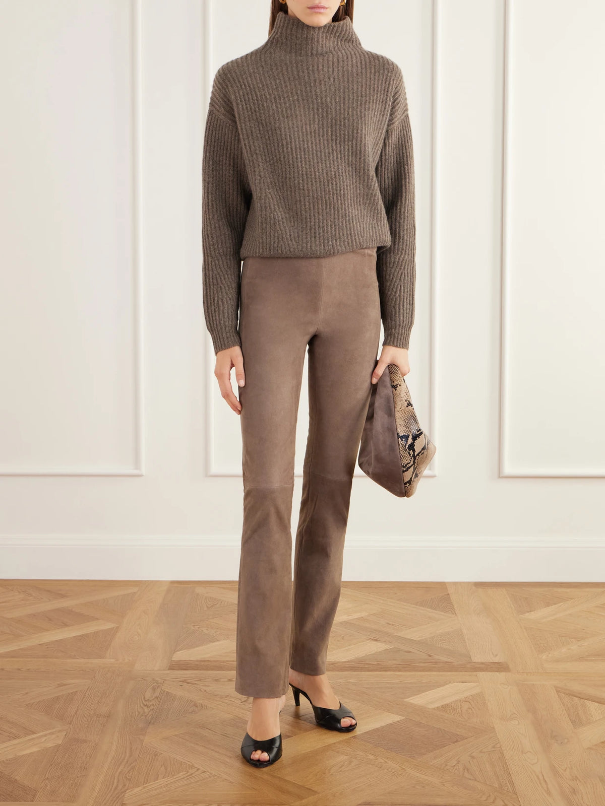 Image of a model wearing Pants. Product name - Albie Paneled Suede Leggings in Taupe colour by brand - ARMA