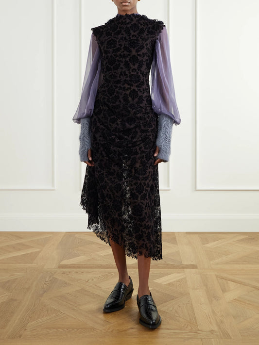 Image of a model wearing Tops. Product name - Alyona Cut-out Silk Blouse in Lilac colour by brand - Pauline Dujancourt
