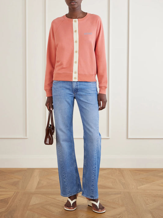 Image of a model wearing Tops. Product name - The Boxy Cotton Cardigan in Coral colour by brand - Mother