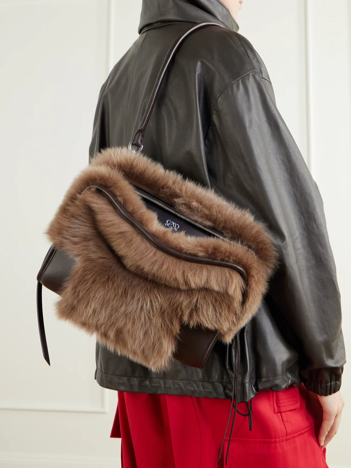 Image of Bags. Product name - Amazona 180 Medium Shearling-trimmed Leather Shoulder Bag in Brown colour by brand - LOEWE