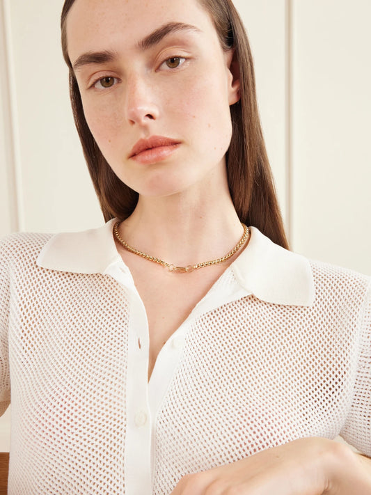 Image of Charms. Product name - Solo Baguette Babylock 14-karat Gold Diamond Pendant in Multi colour by brand - Marla Aaron