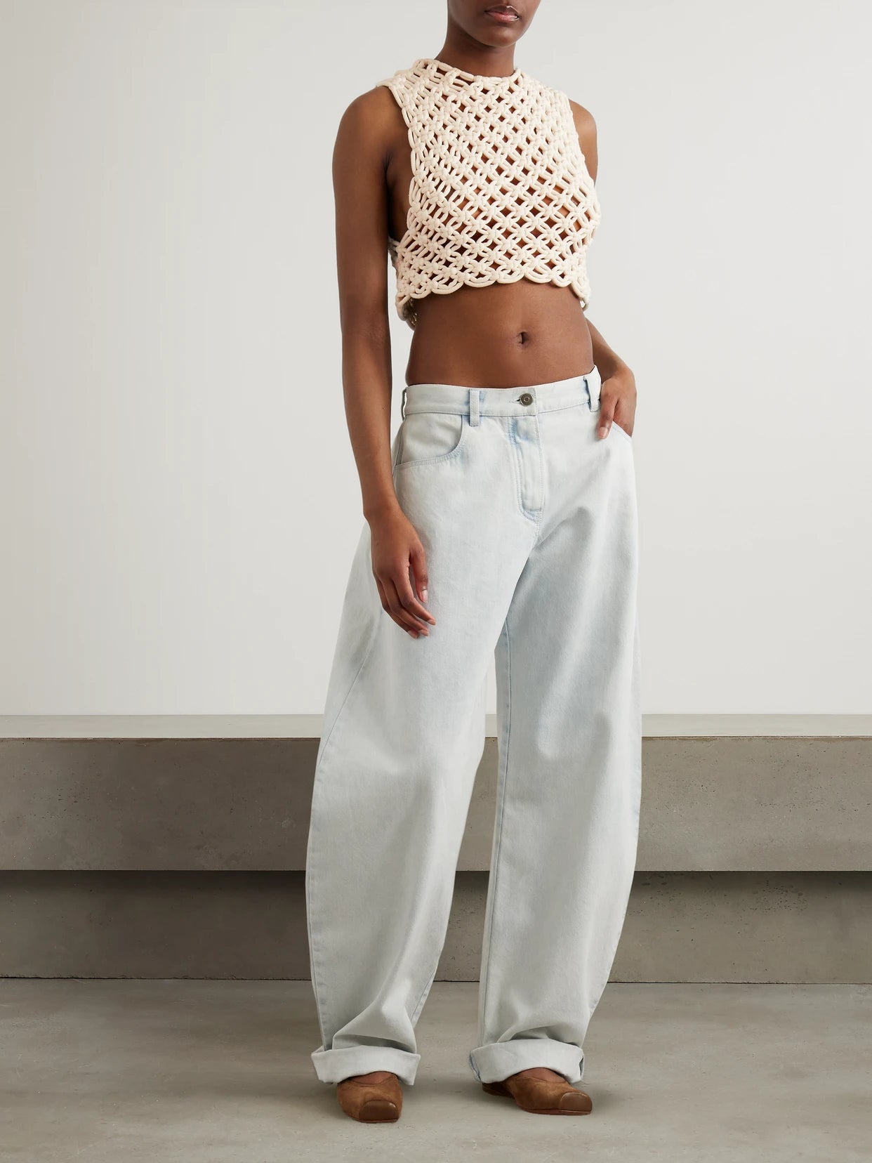 Image of Jeans. Product name - Low-rise Barrel-leg Jeans in Light denim colour by brand - Alaïa