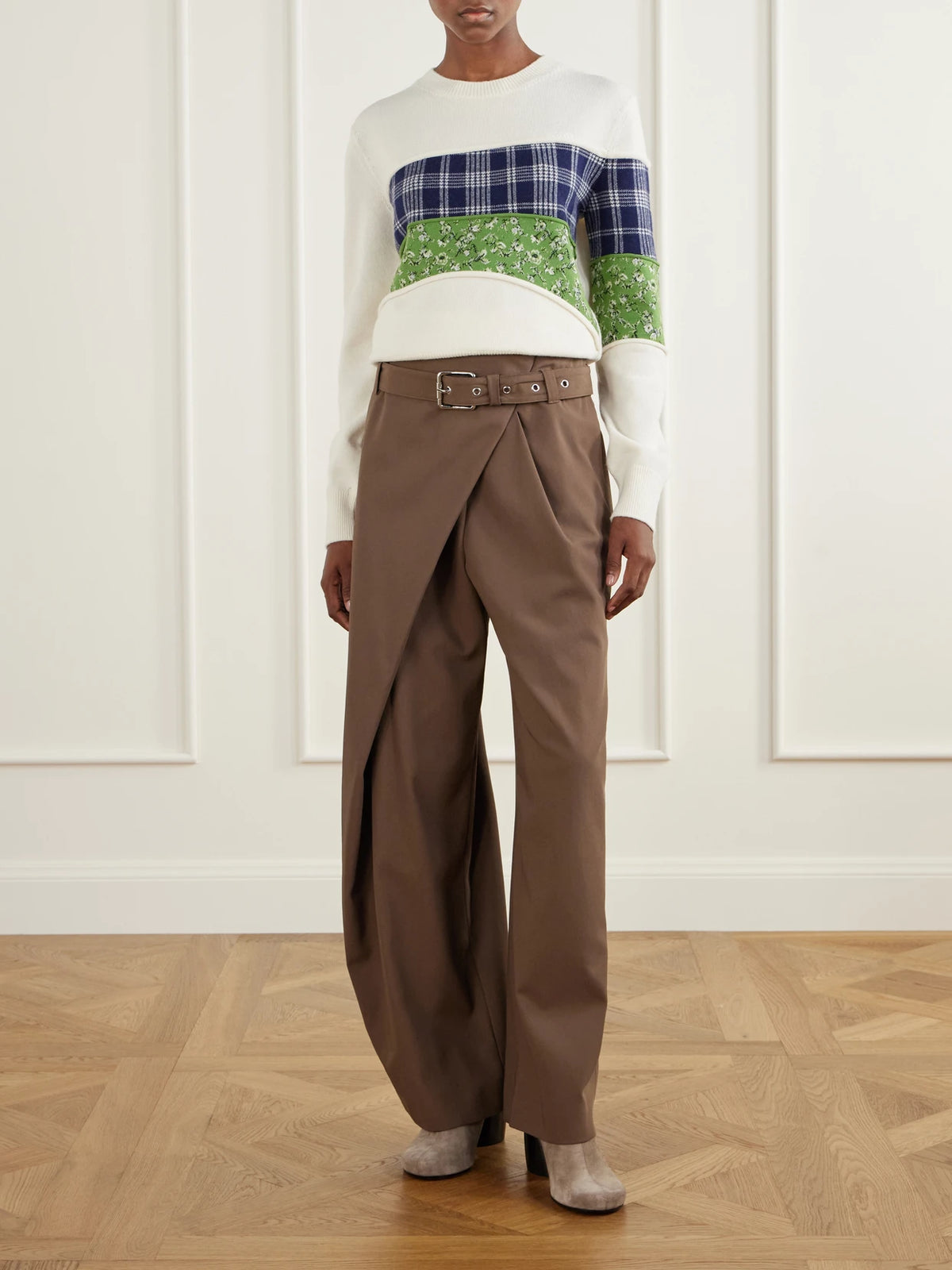 Image of a model wearing Outerwear. Product name - Embroidered Wool-blend Sweater in White colour by brand - LOEWE