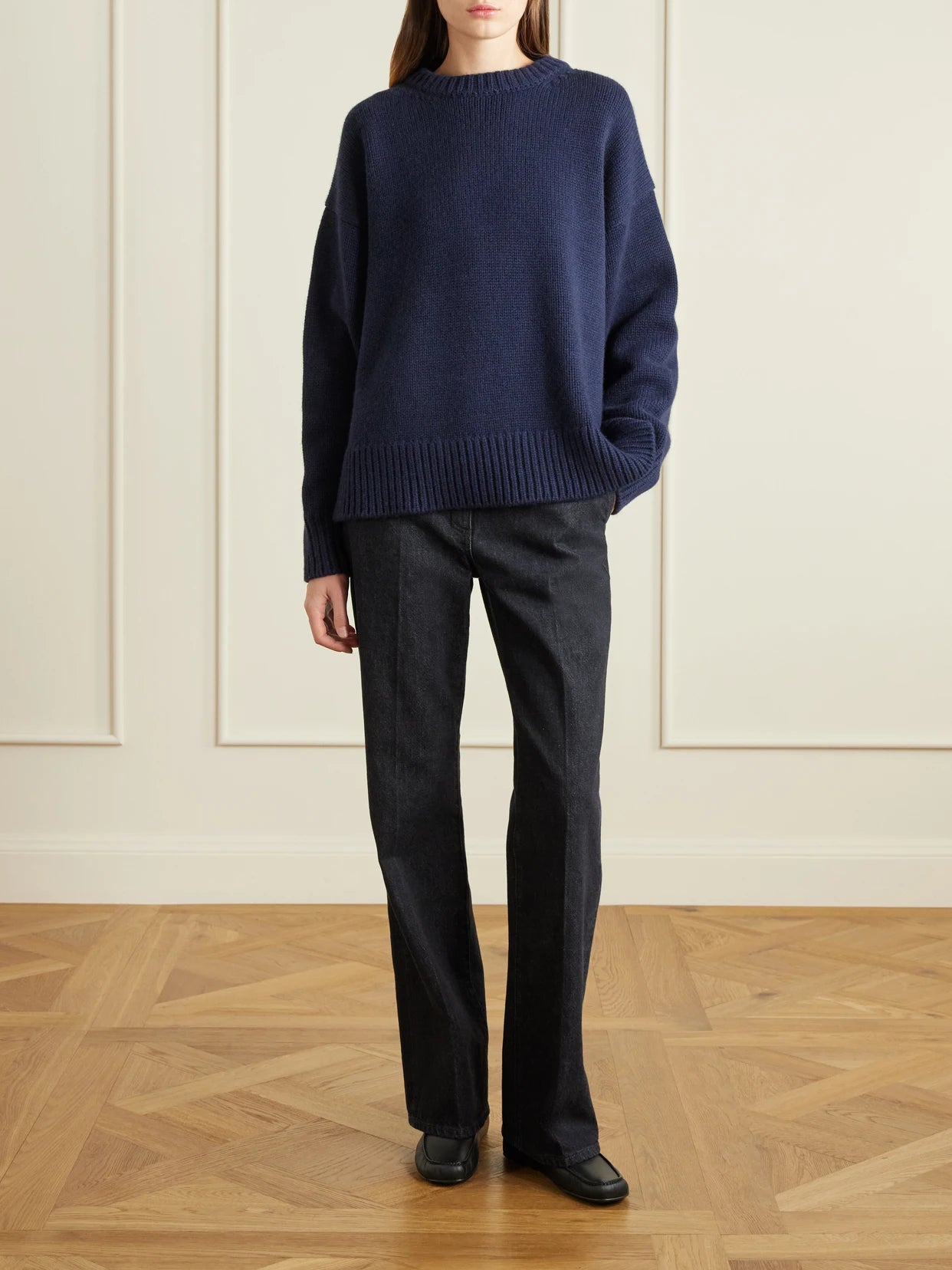 Image of a model wearing Outerwear. Product name - Essentials Ophelia Oversized Wool And Cashmere-blend Sweater in Navy colour by brand - The Row