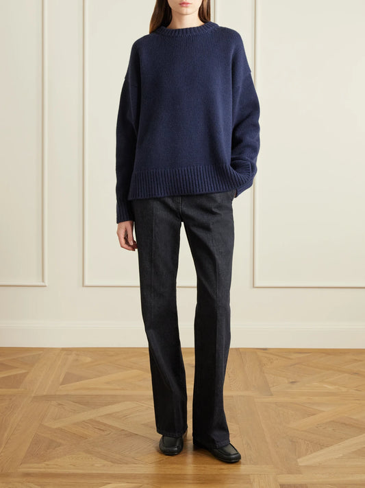 Image of a model wearing Outerwear. Product name - Essentials Ophelia Oversized Wool And Cashmere-blend Sweater in Navy colour by brand - The Row