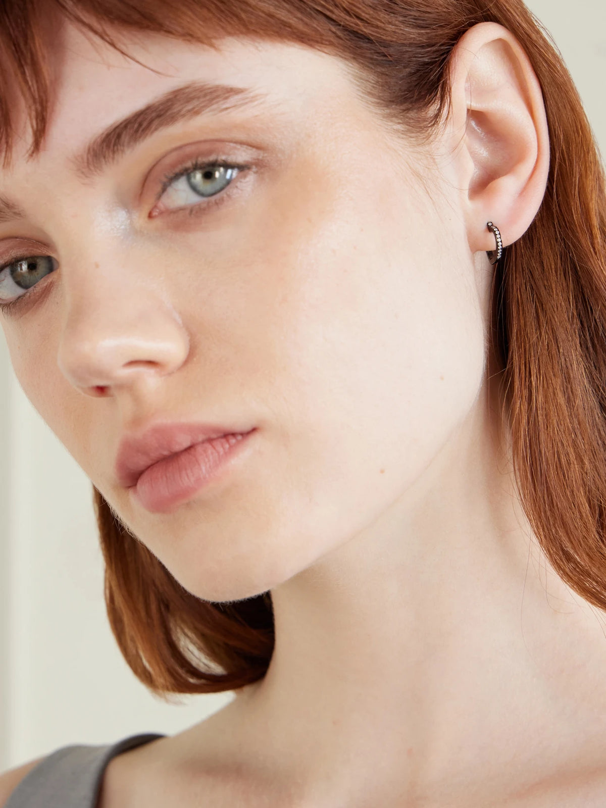Image of Earrings. Product name - Antifer Heart Small 18-karat Black Gold Diamond Single Earring in Multi colour by brand - Repossi