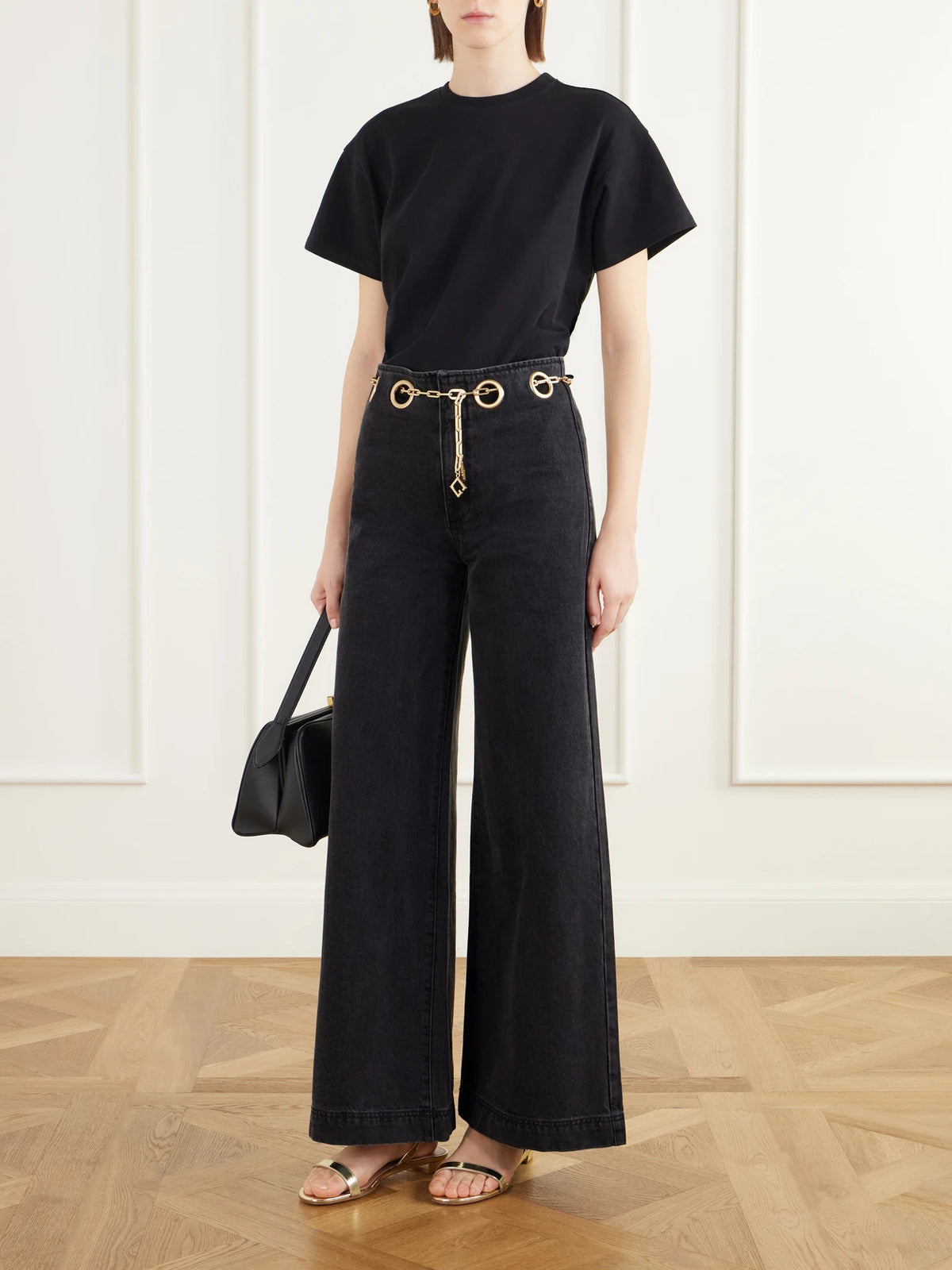 Image of Jeans. Product name - Sydney Embellished Low-rise Flared Jeans in Black colour by brand - Cult Gaia