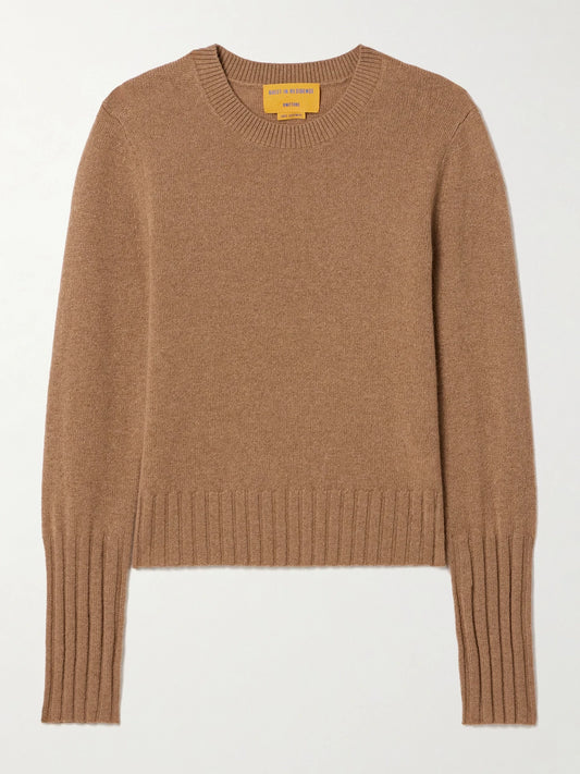 Image of a model wearing Outerwear. Product name - Shrunken Cashmere Sweater in Camel colour by brand - Guest In Residence
