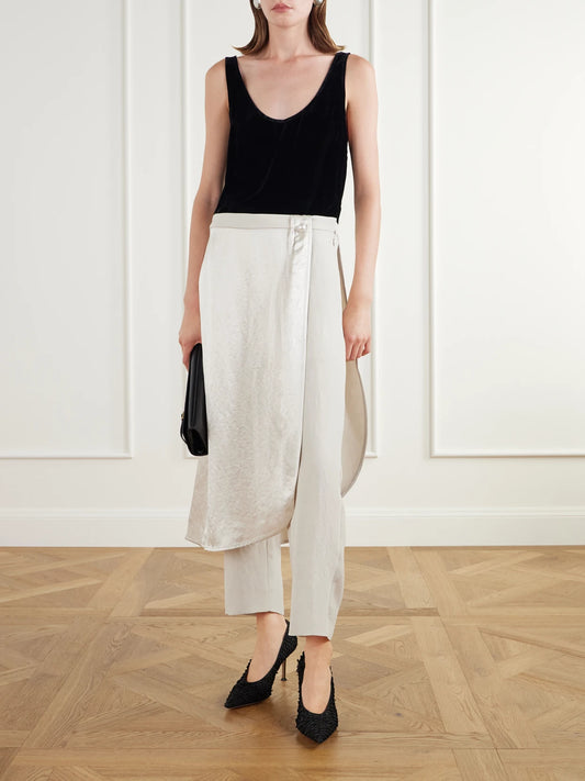 Image of a model wearing Tops. Product name - Lace-trimmed Velvet Cami in Black colour by brand - Maria McManus