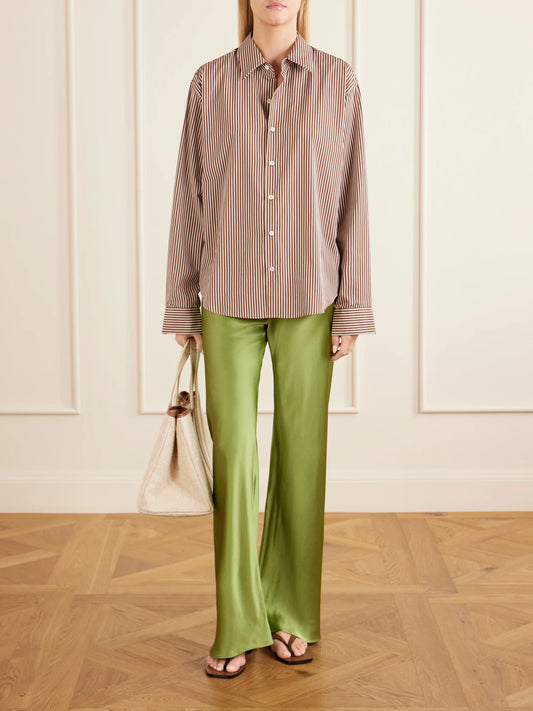 Image of a model wearing Pants. Product name - Silk-bias Straight-leg Pants in Green colour by brand - Comme Si