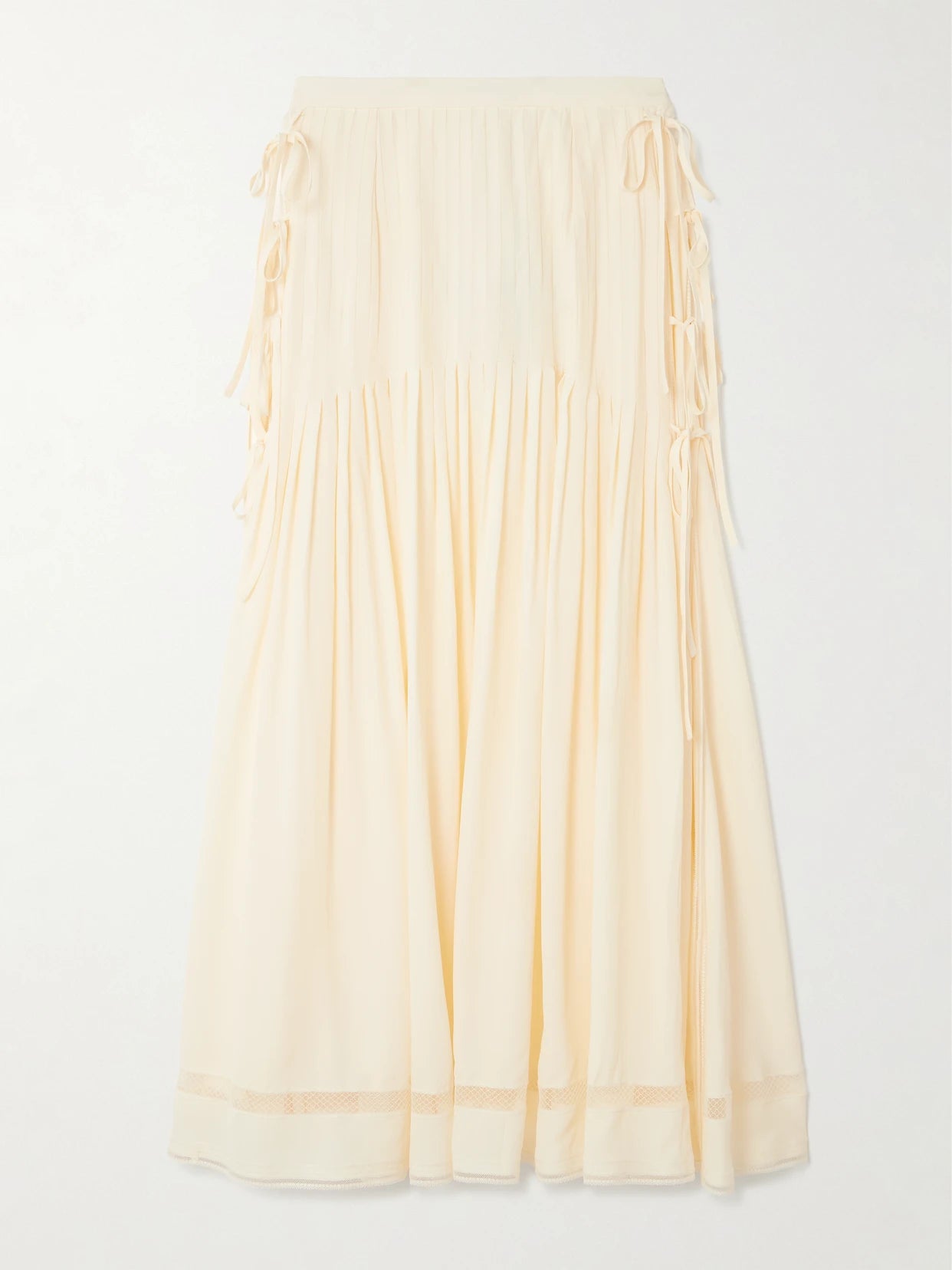 Image of a model wearing Skirts. Product name - Tie-detailed Pleated Crepe Midi Skirt in Ecru colour by brand - RABANNE