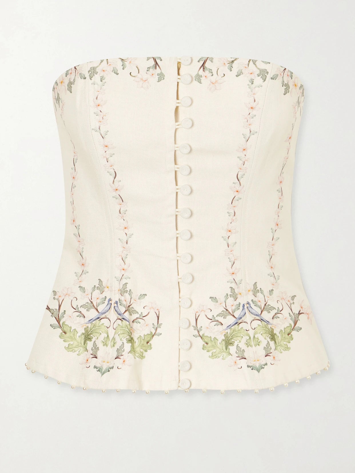 Image of a model wearing Tops. Product name - Tota Anhelo Embellished Floral-printed Linen Corset Top in Cream colour by brand - Agua by Agua Bendita